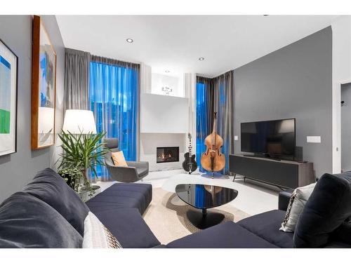 2036 31 Avenue Sw, Calgary, AB - Indoor Photo Showing Living Room With Fireplace