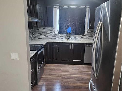 244 Whitworth Way Ne, Calgary, AB - Indoor Photo Showing Kitchen With Stainless Steel Kitchen With Double Sink