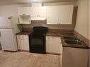 244 Whitworth Way Ne, Calgary, AB  - Indoor Photo Showing Kitchen With Double Sink 