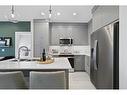 1111-395 Skyview Parkway Ne, Calgary, AB  - Indoor Photo Showing Kitchen With Stainless Steel Kitchen With Double Sink With Upgraded Kitchen 