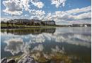 1405-17 Country Village Bay Ne, Calgary, AB  - Outdoor With Body Of Water With View 