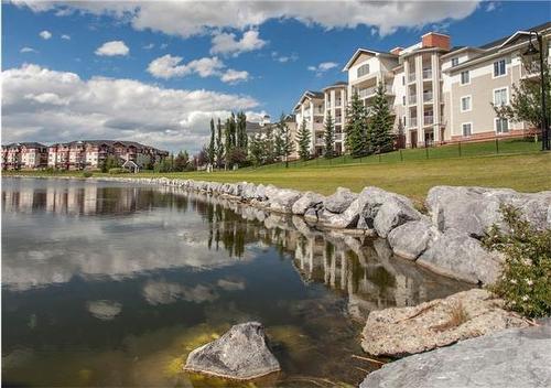 1405-17 Country Village Bay Ne, Calgary, AB - Outdoor With Body Of Water With View