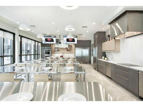 201-2231 Mahogany Boulevard Se, Calgary, AB - Indoor Photo Showing Kitchen With Upgraded Kitchen