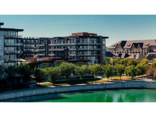 201-2231 Mahogany Boulevard Se, Calgary, AB - Outdoor With Body Of Water With Balcony