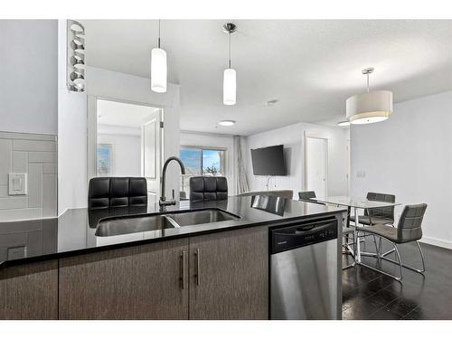 1304-240 Skyview Ranch Road Ne, Calgary, AB - Indoor Photo Showing Kitchen With Double Sink