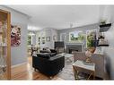 206-2416 Erlton Street Sw, Calgary, AB  - Indoor Photo Showing Living Room With Fireplace 