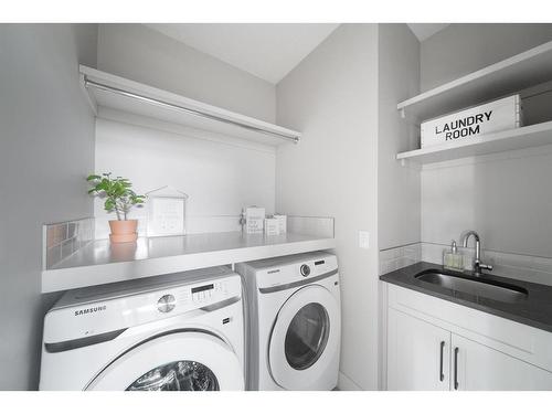 100 Royal Elm Green Nw, Calgary, AB - Indoor Photo Showing Laundry Room