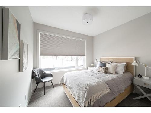 100 Royal Elm Green Nw, Calgary, AB - Indoor Photo Showing Bedroom