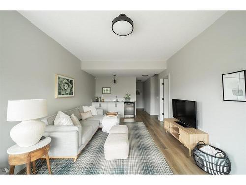 100 Royal Elm Green Nw, Calgary, AB - Indoor Photo Showing Living Room