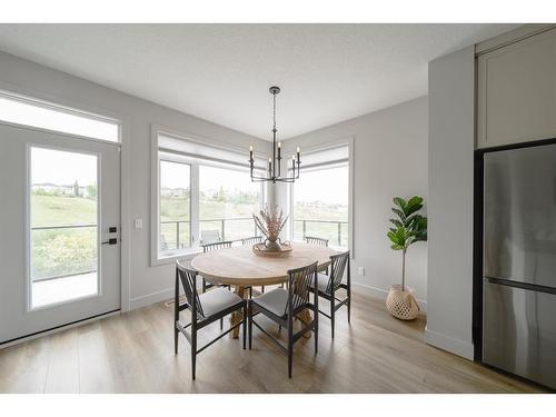 100 Royal Elm Green Nw, Calgary, AB - Indoor Photo Showing Dining Room