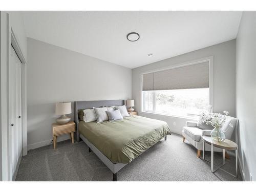 100 Royal Elm Green Nw, Calgary, AB - Indoor Photo Showing Bedroom