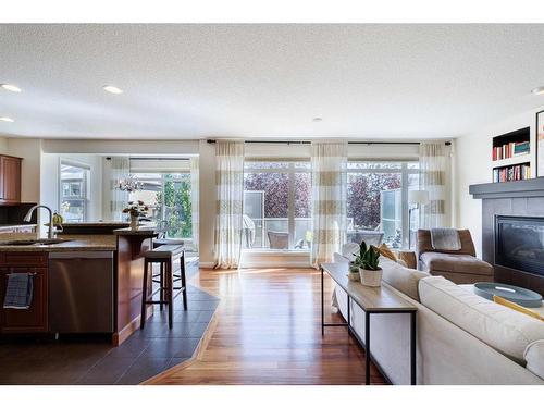 311 Royal Oak Circle Nw, Calgary, AB - Indoor Photo Showing Living Room With Fireplace