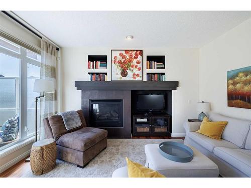 311 Royal Oak Circle Nw, Calgary, AB - Indoor Photo Showing Living Room With Fireplace