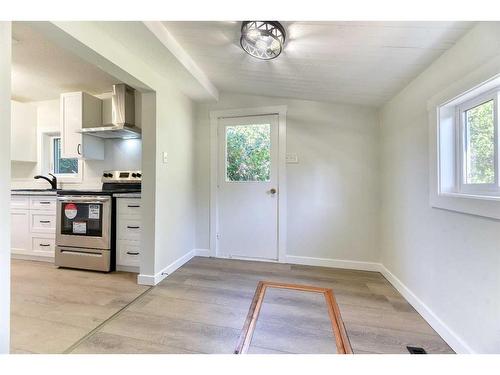 223 Royal Avenue, Diamond Valley, AB - Indoor Photo Showing Kitchen