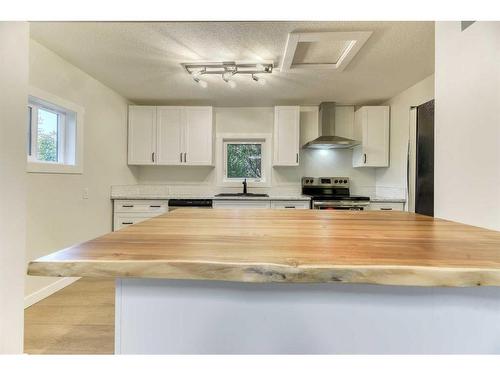 223 Royal Avenue, Diamond Valley, AB - Indoor Photo Showing Kitchen