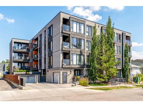 404-414 Meredith Road Ne, Calgary, AB - Outdoor With Balcony With Facade