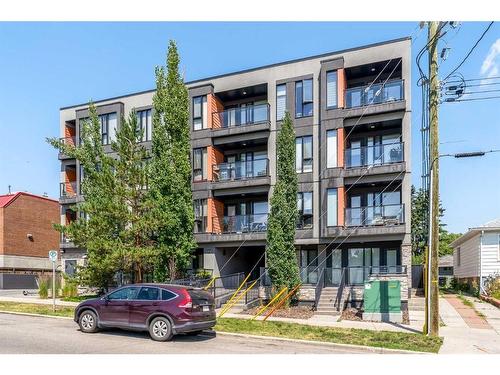 404-414 Meredith Road Ne, Calgary, AB - Outdoor With Balcony With Facade