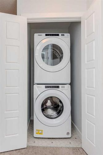 73 Legacy Glen Place Se, Calgary, AB - Indoor Photo Showing Laundry Room