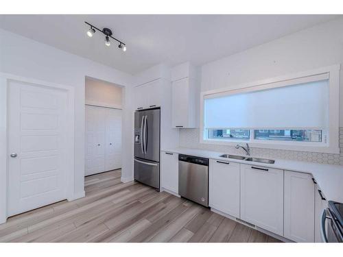 73 Legacy Glen Place Se, Calgary, AB - Indoor Photo Showing Kitchen With Stainless Steel Kitchen With Double Sink