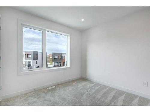 50 Na'A Heights Sw, Calgary, AB - Indoor Photo Showing Other Room