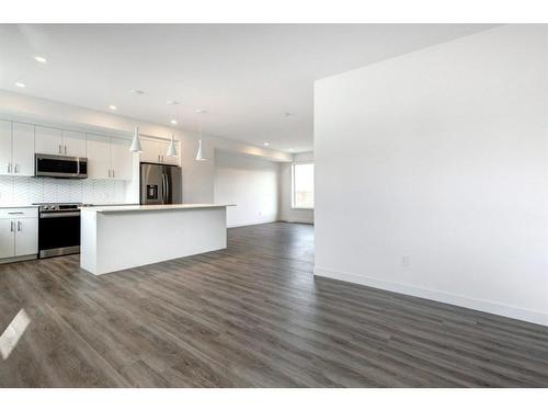 50 Na'A Heights Sw, Calgary, AB - Indoor Photo Showing Kitchen