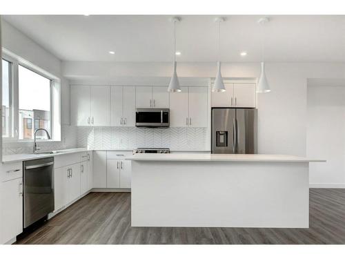 50 Na'A Heights Sw, Calgary, AB - Indoor Photo Showing Kitchen With Upgraded Kitchen