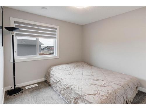 116 Livingston Parade Ne, Calgary, AB - Indoor Photo Showing Bedroom