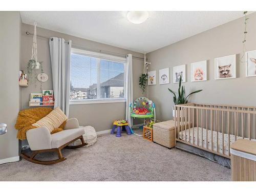 84 New Brighton Landing Se, Calgary, AB - Indoor Photo Showing Bedroom