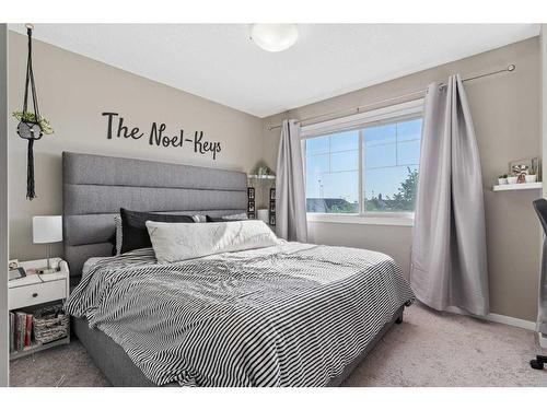 84 New Brighton Landing Se, Calgary, AB - Indoor Photo Showing Bedroom