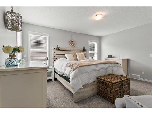 203 Bayview Circle Sw, Airdrie, AB - Indoor Photo Showing Bedroom