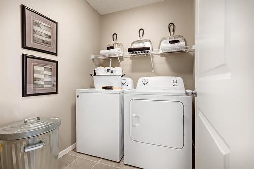 359 Sora Boulevard Se, Calgary, AB - Indoor Photo Showing Laundry Room