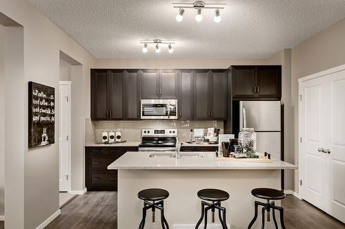 359 Sora Boulevard Se, Calgary, AB - Indoor Photo Showing Kitchen