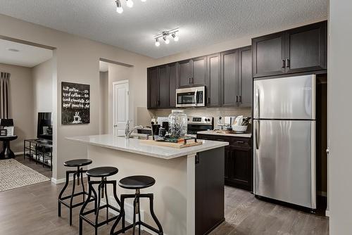 359 Sora Boulevard Se, Calgary, AB - Indoor Photo Showing Kitchen