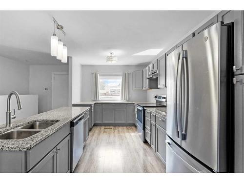 5517 50 Street, Olds, AB - Indoor Photo Showing Kitchen With Double Sink With Upgraded Kitchen