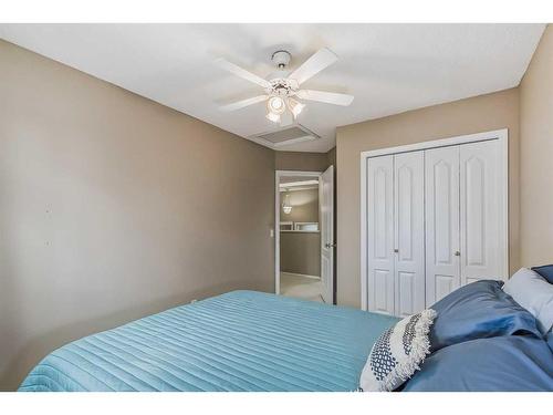 97 Douglas Ridge Circle Se, Calgary, AB - Indoor Photo Showing Bedroom