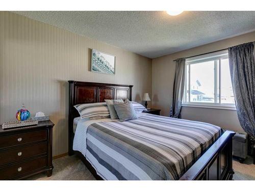 92 Martinwood Road Ne, Calgary, AB - Indoor Photo Showing Bedroom