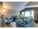 92 Martinwood Road Ne, Calgary, AB  - Indoor Photo Showing Living Room With Fireplace 