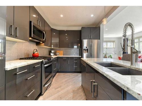 3651 77 Street Nw, Calgary, AB - Indoor Photo Showing Kitchen With Stainless Steel Kitchen With Double Sink With Upgraded Kitchen