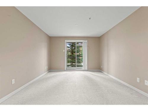 3203-92 Crystal Shores Road, Okotoks, AB - Indoor Photo Showing Other Room