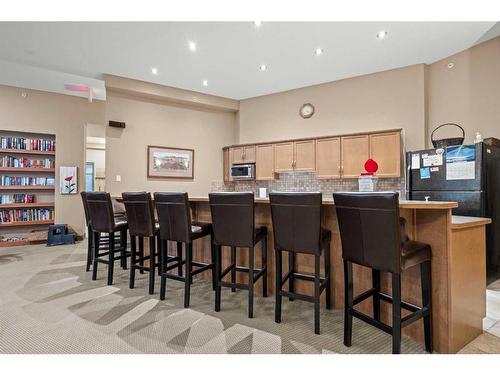 3203-92 Crystal Shores Road, Okotoks, AB - Indoor Photo Showing Dining Room