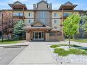 3203-92 Crystal Shores Road, Okotoks, AB  - Outdoor With Facade 