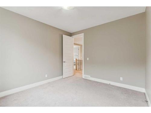 156 Rainbow Falls Glen, Chestermere, AB - Indoor Photo Showing Other Room