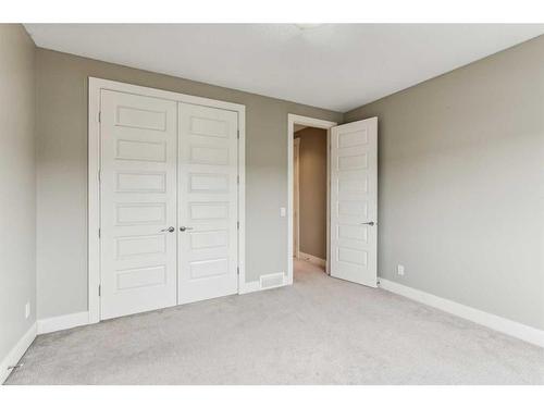 156 Rainbow Falls Glen, Chestermere, AB - Indoor Photo Showing Other Room