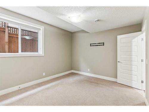 156 Rainbow Falls Glen, Chestermere, AB - Indoor Photo Showing Other Room