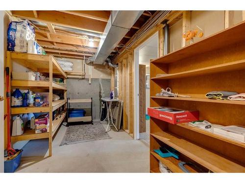 21 Vandoos Villas Nw, Calgary, AB - Indoor Photo Showing Basement