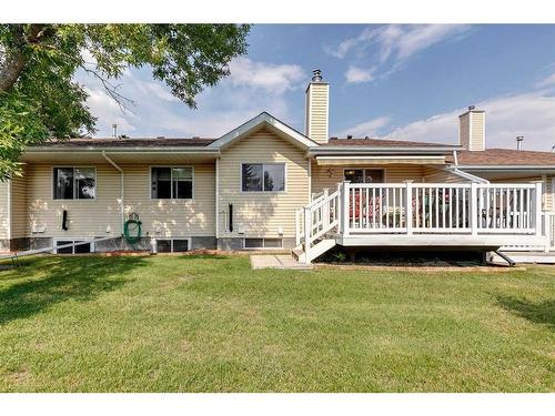 21 Vandoos Villas Nw, Calgary, AB - Outdoor With Deck Patio Veranda