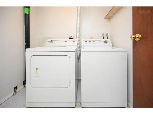 109 Tararidge Close Ne, Calgary, AB - Indoor Photo Showing Laundry Room