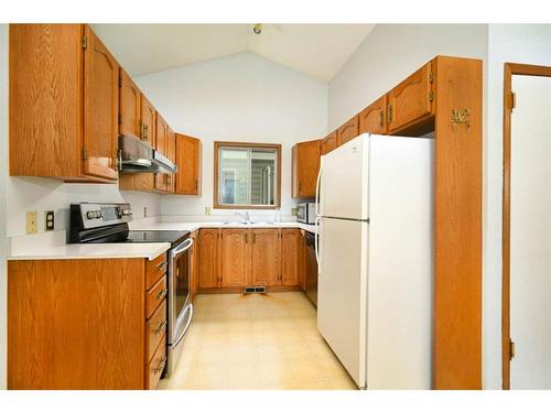 109 Tararidge Close Ne, Calgary, AB - Indoor Photo Showing Kitchen