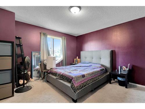 108 Tuscany Springs Gardens Nw, Calgary, AB - Indoor Photo Showing Bedroom