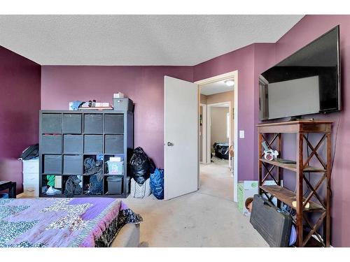 108 Tuscany Springs Gardens Nw, Calgary, AB - Indoor Photo Showing Bedroom